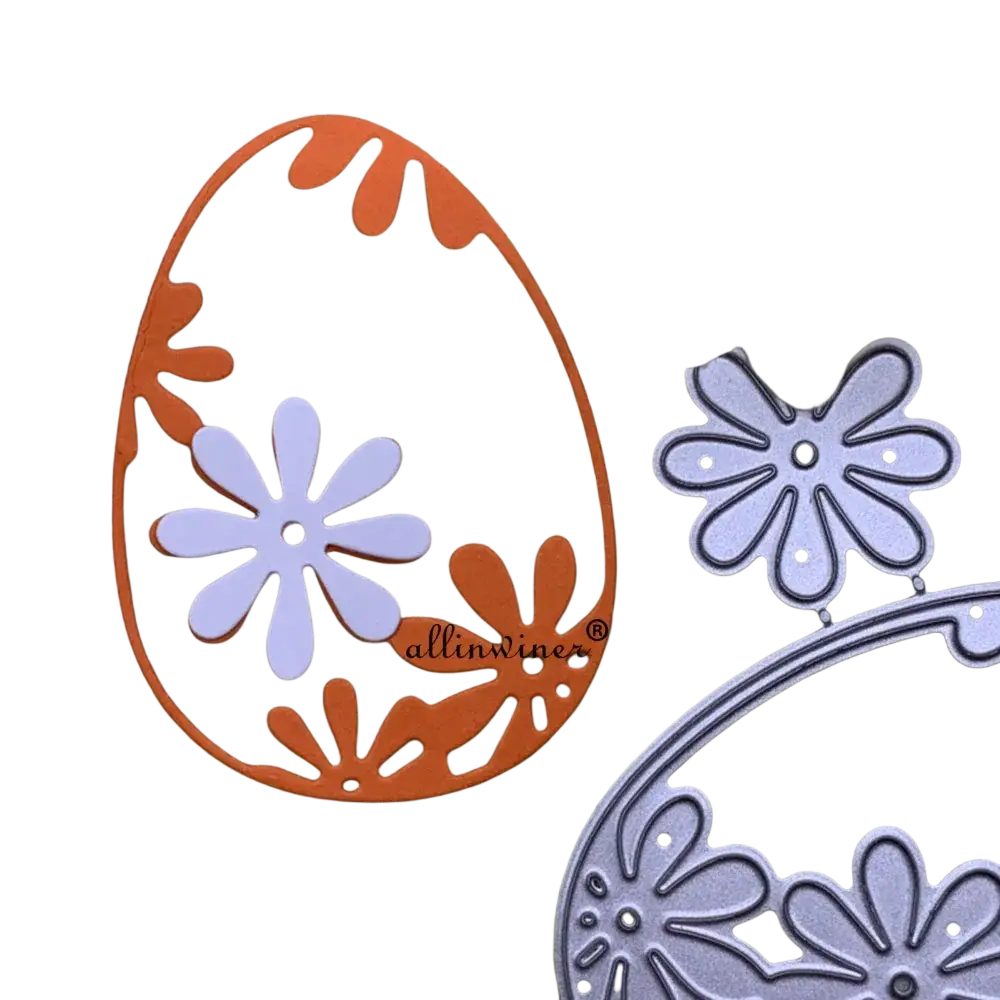 Orange and white floral egg-shaped metal cutting die with intricate leaf patterns for easter scrapbook stencil
