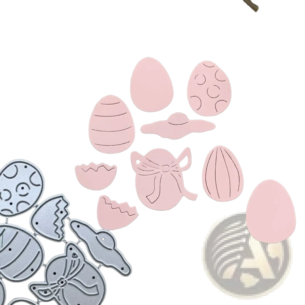 Easter egg metal cutting dies in pink and silver featuring die-cut eggs with patterns bows and broken egg pieces for scrapbooking