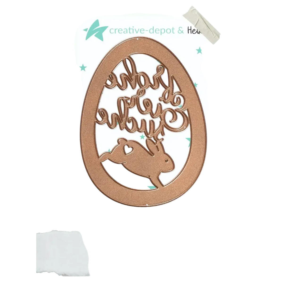 Copper-colored metal die-cut easter egg with bunny silhouette and cursive whats up text for baby cutting dies