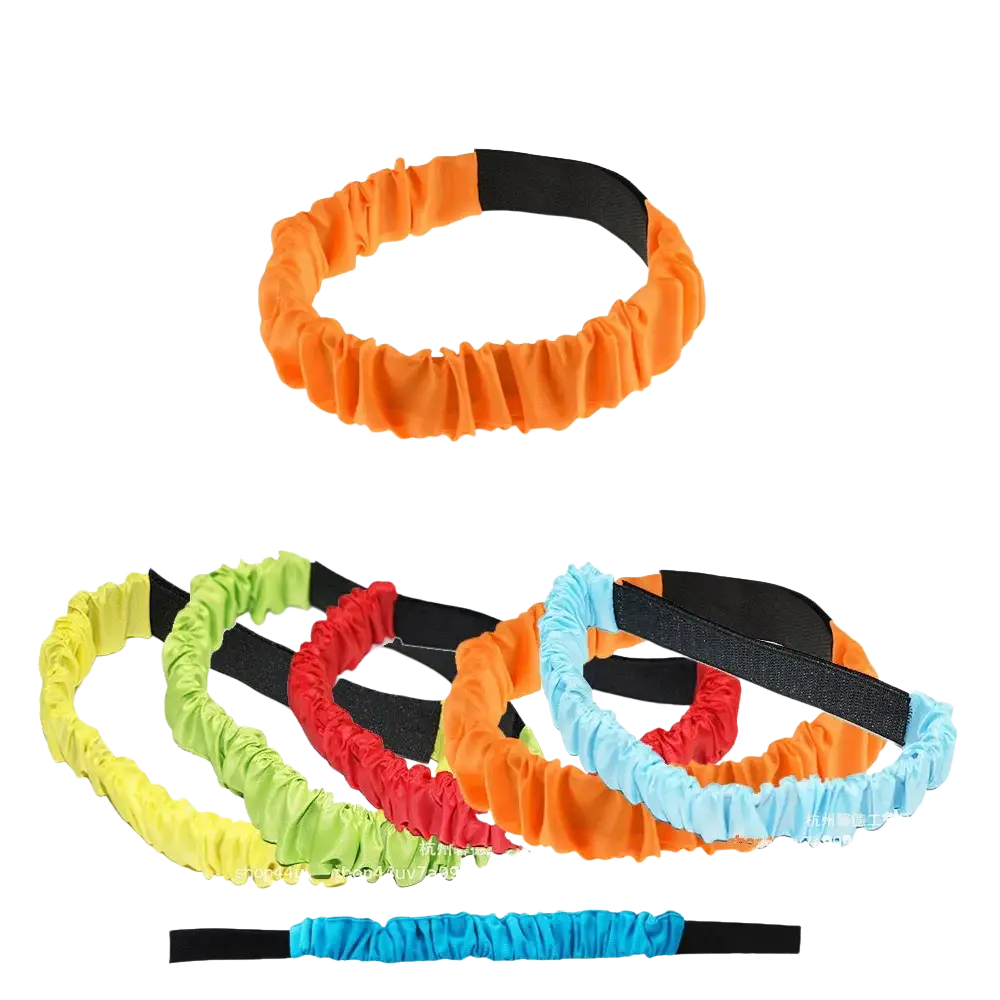 Bright orange elastic tie rope with black fabric band in easter egg and spoon race game set for kids