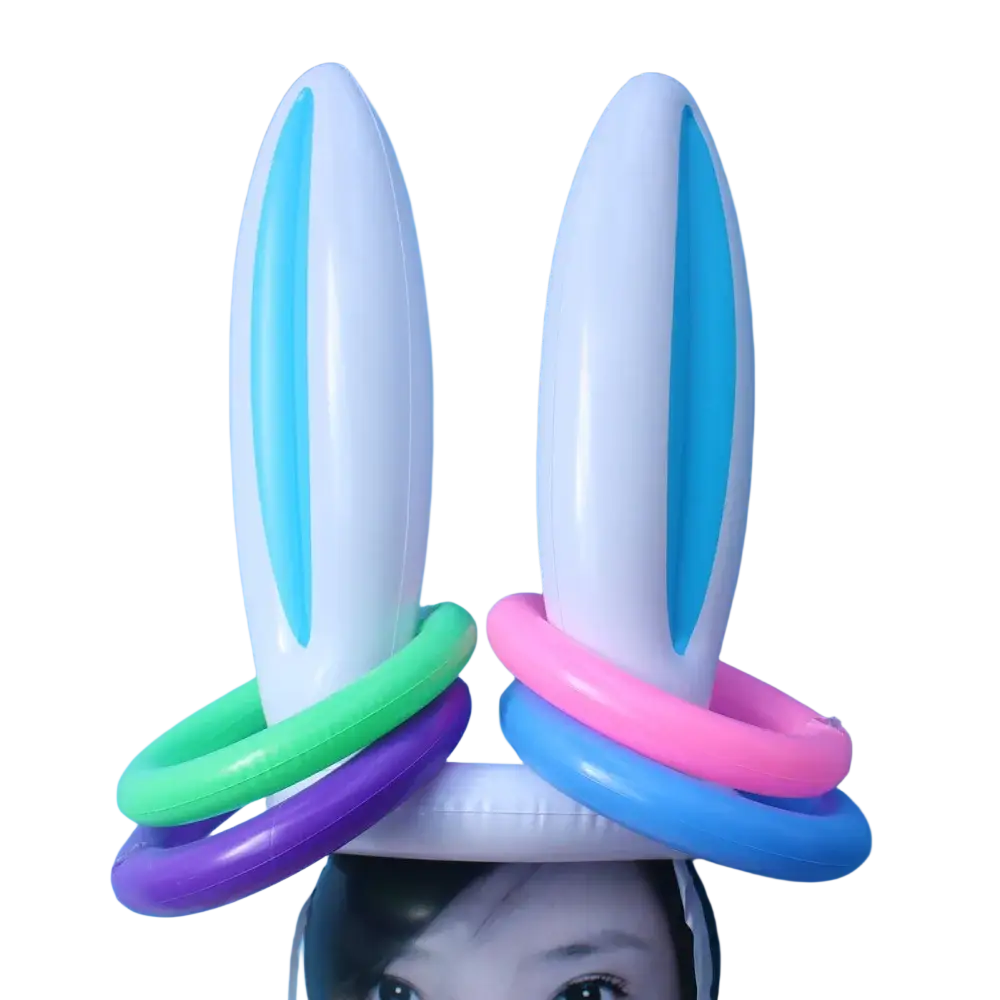 Inflatable bunny ears headband with white exterior light blue inner panels and colorful plastic rings for easter egg race