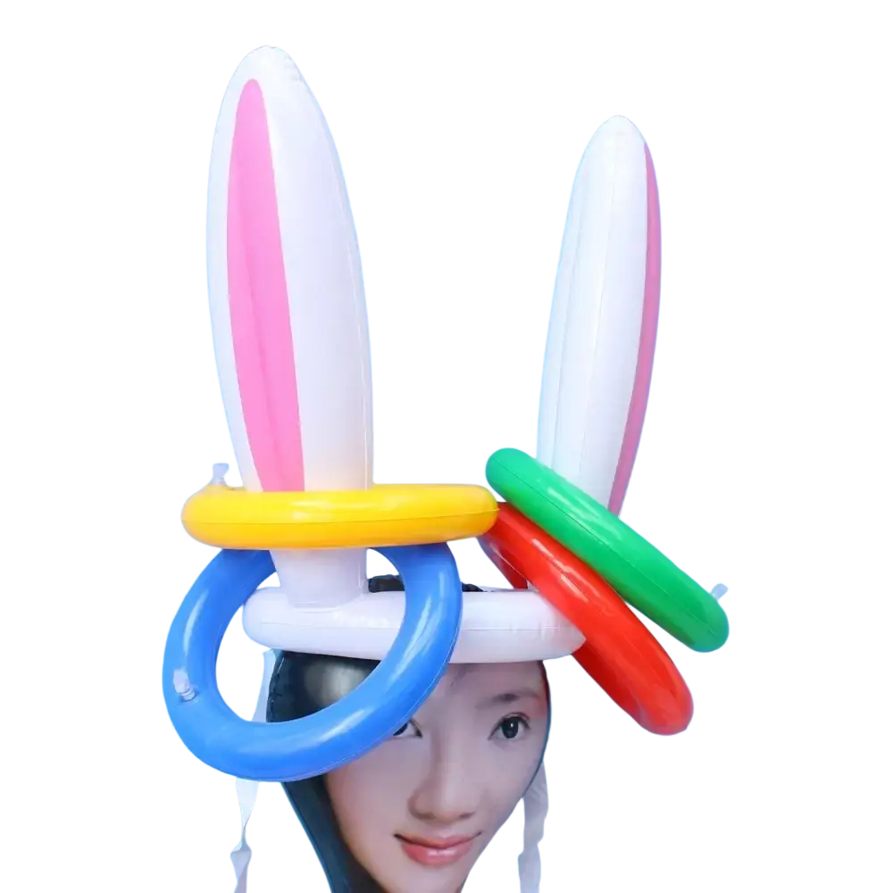 Easter egg and spoon race game set for kids featuring a playful inflatable bunny hat with white ears and colorful rings
