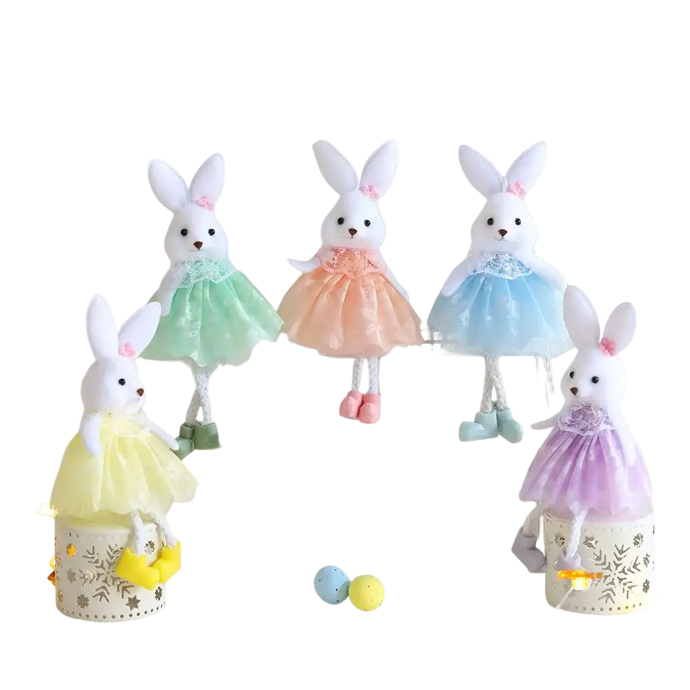 Four plush white bunny ornaments dressed in pastel lace trimmed tulle dresses in green peach blue and purple for easter
