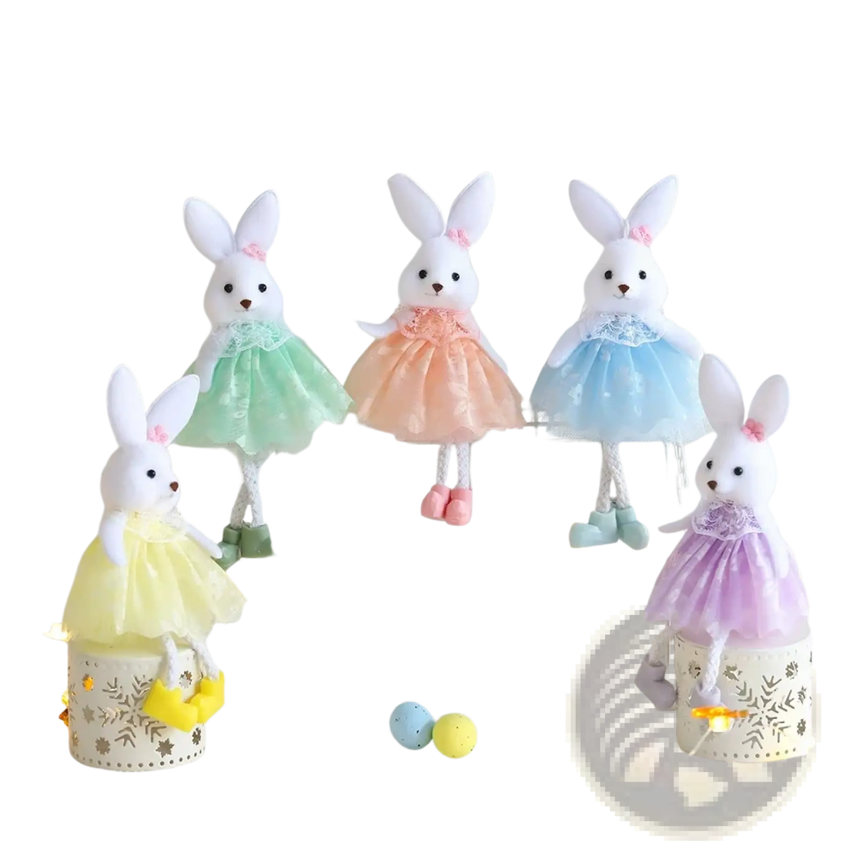 Four plush white bunny ornaments dressed in pastel lace trimmed tulle dresses in green peach blue and purple for easter