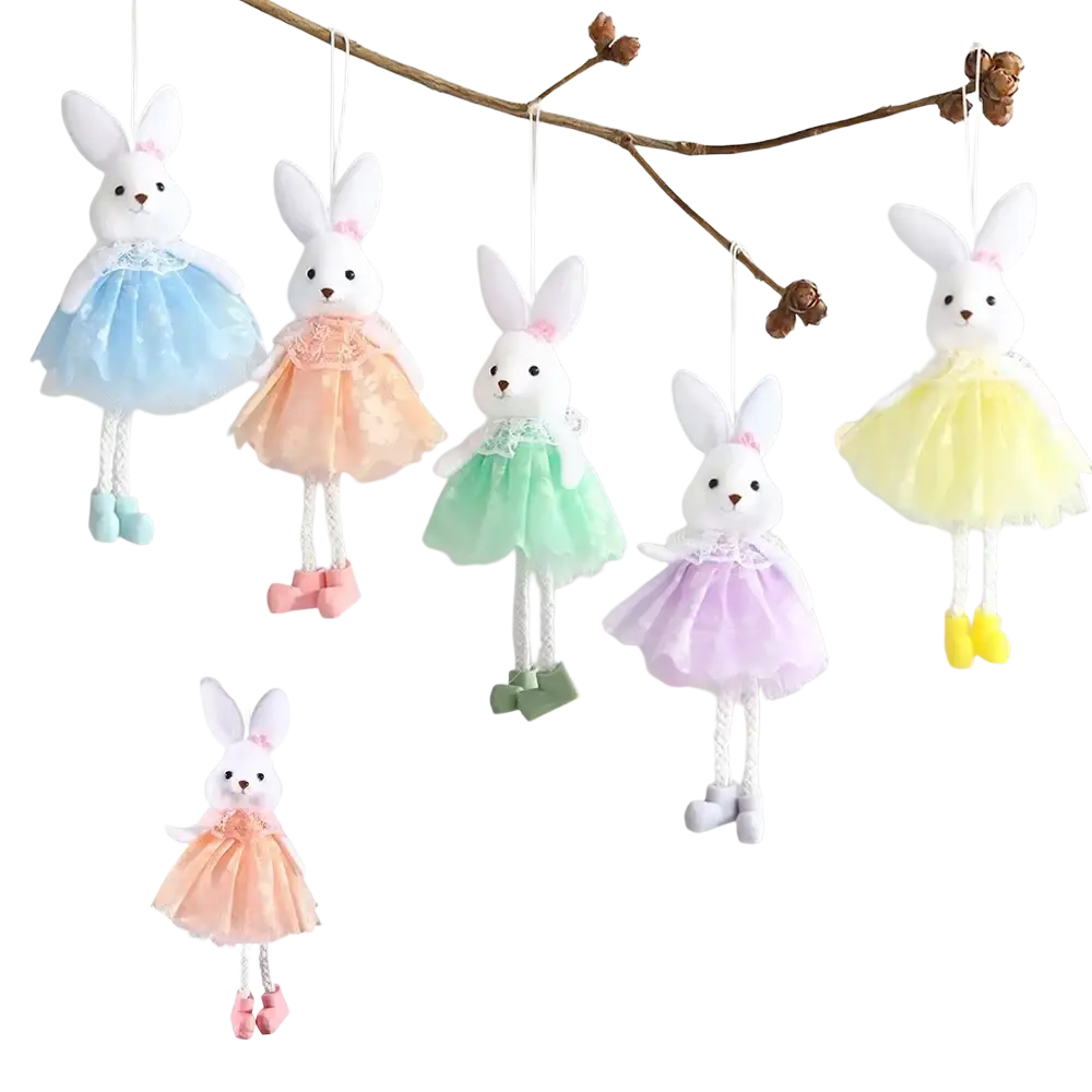Pastel-colored plush bunny ornaments with lace-trimmed tutus and matching shoes hanging from strings in easter fairy set