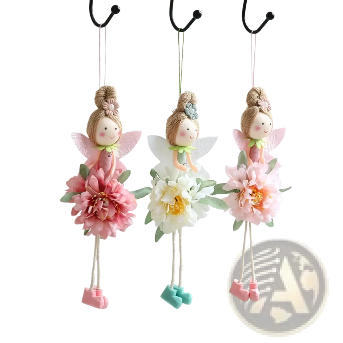 Three delicate Easter flower fairy pendant dolls with pastel floral felt skirts hanging from hooks