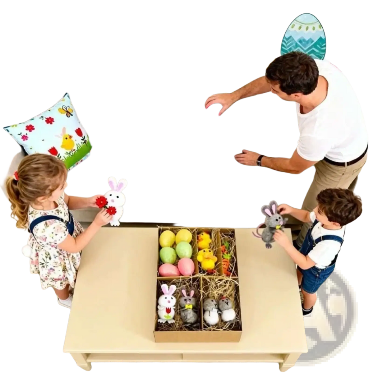 A pink easter egg with a glossy finish nestled in straw inside a decorative box from easter garden scene figurine diy decoration set