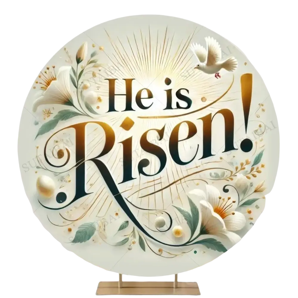 Easter he is risen round backdrop featuring elegant black and gold script, white lilies, green leaves, and a dove on a metal stand