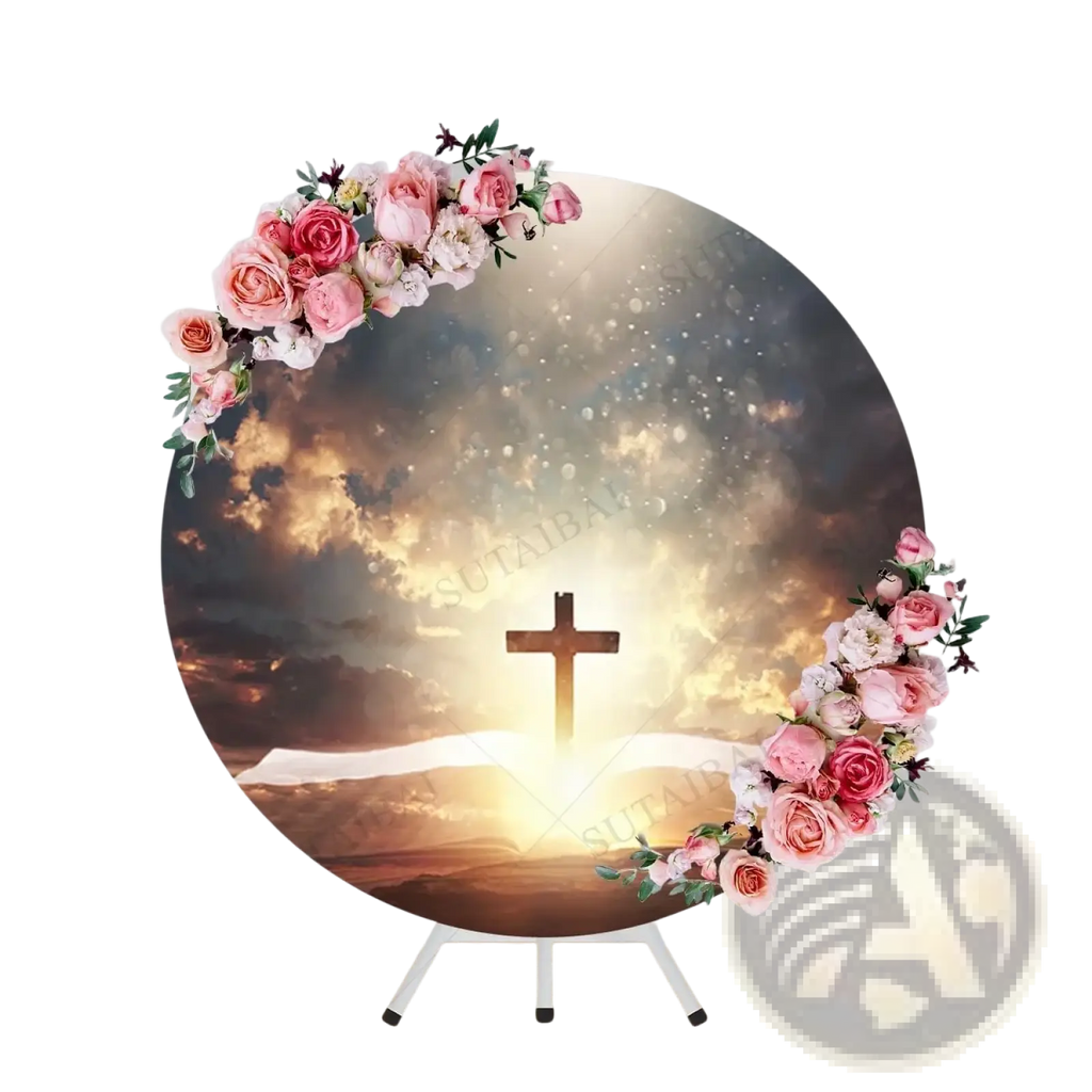 Easter he is risen round backdrop featuring a cross over an open book with pink and white roses against a sky