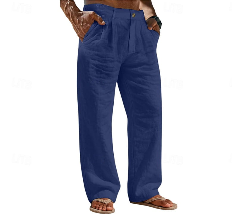 Pantalones de algodón y lino de ajuste relajado para hombre en color azul marino profundo, con un estilo relajado de ajuste holgado y detalles en la parte delantera plisada.
