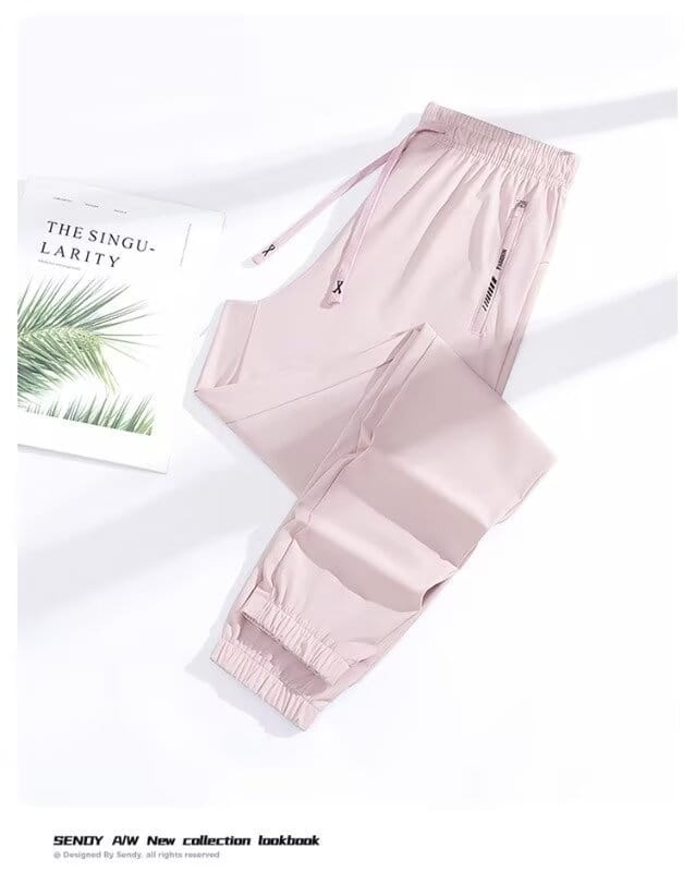 Light pink slim-fit anti-mosquito casual athletic trousers with elastic cuffs and side pockets designed for comfort and protection.