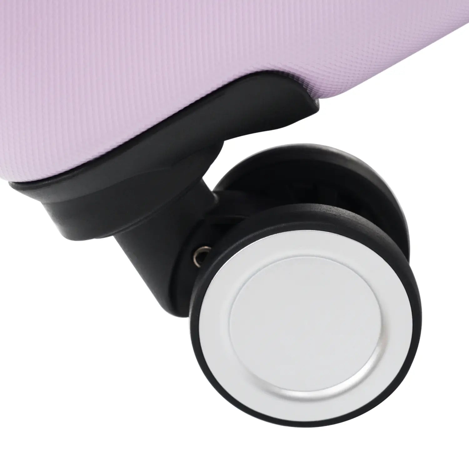 close-up of the wheel assembly on a light purple lavender hardshell suitcase featuring black plastic housing and a white spinner wheel with a metallic rim from a 6 piece luggage set
