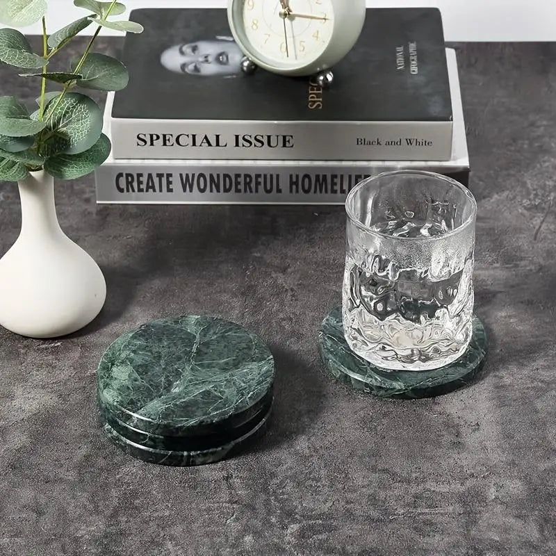 dark green marble coasters set of 4 round stone pads with a swirling veined pattern