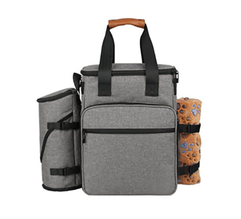 Dog food travel backpack gray insulated pet bag with black straps wooden handle and side compartments for storage.