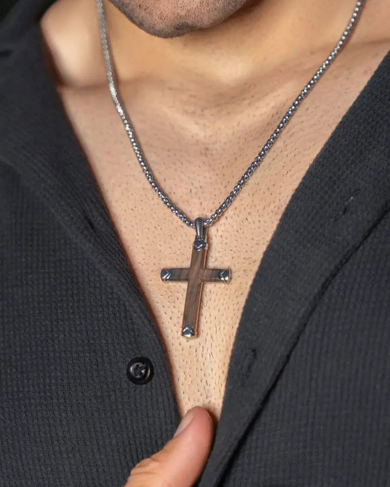 A sleek silver-toned ebony wood cross pendant with textured surface and 3mm box chain necklace