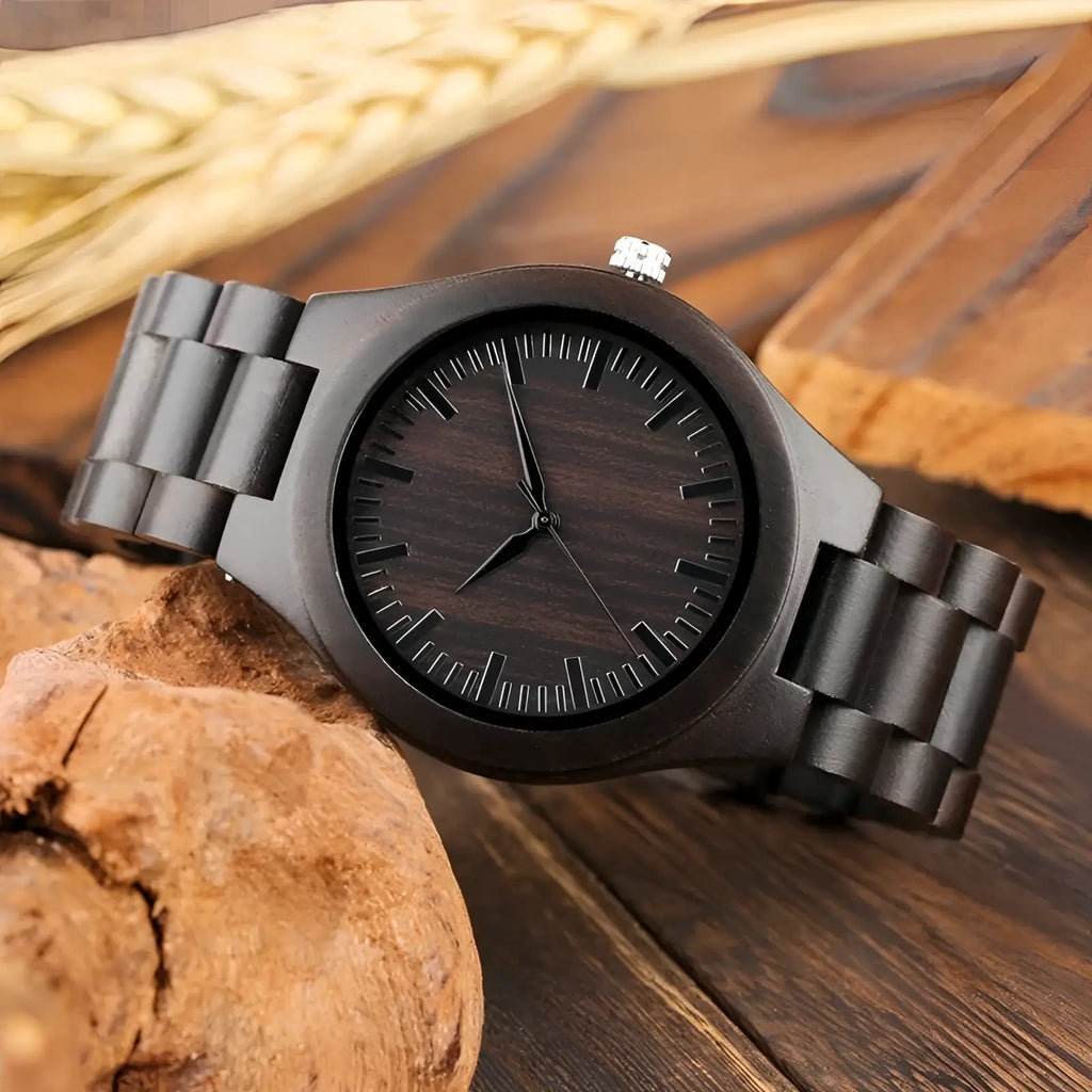 Ebony wood quartz watch for men featuring a black wooden band and sleek minimalist dark wood grain face