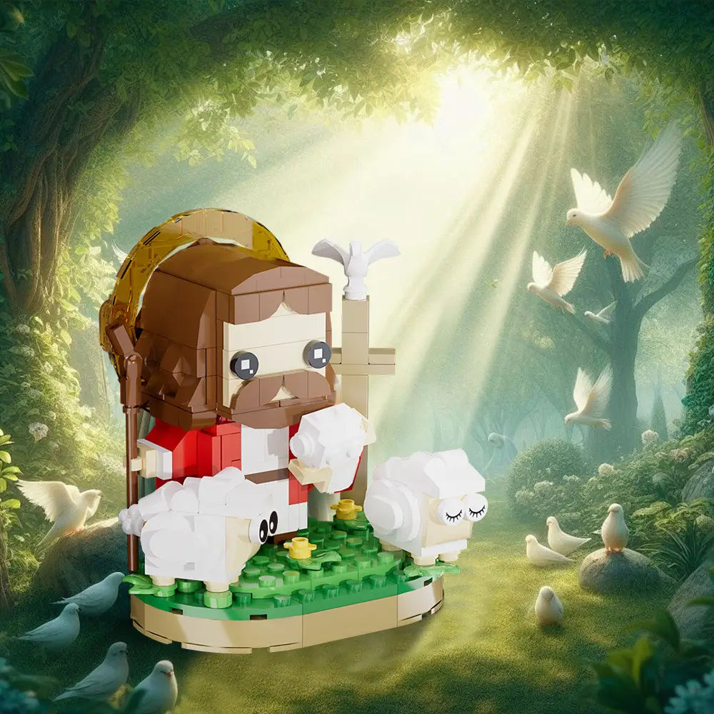 Une figurine Lego BrickHeadz de Jésus, aux cheveux bruns et à la barbe, portant une robe rouge et un halo doré, debout à côté de deux moutons blancs sur une plaque de base verte, dans le modèle de blocs de construction Jésus berger avec moutons.
