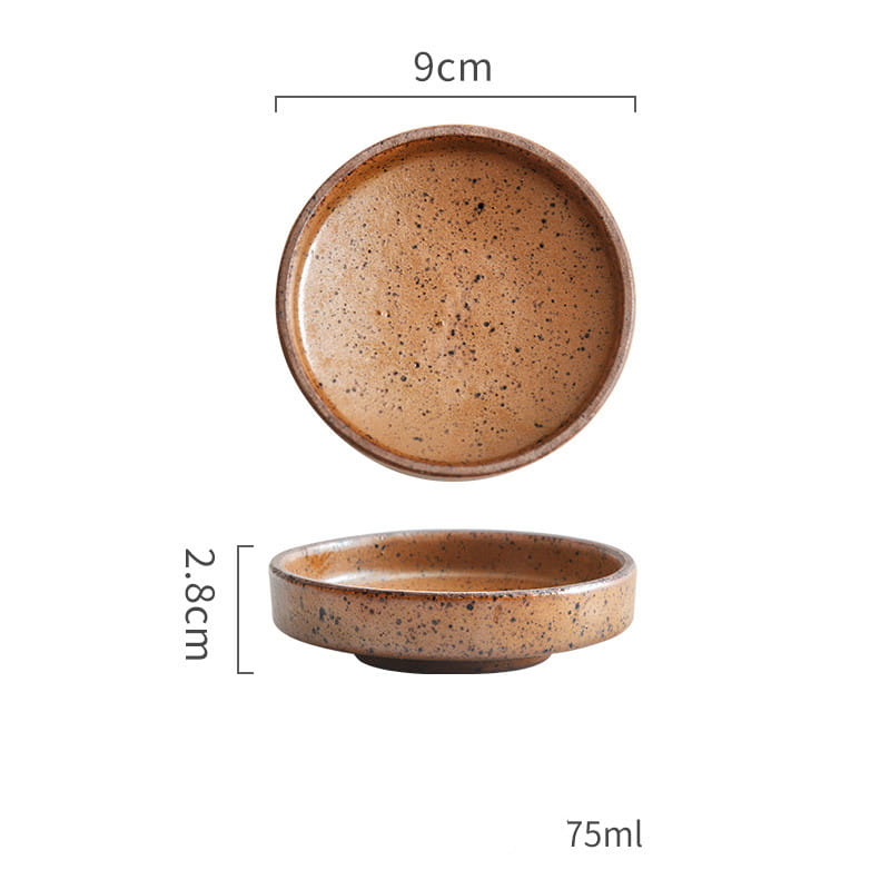 A rustic speckled brown ceramic sauce dish with a 9cm diameter and 2.8cm height designed as a Japanese dipping bowl for serving small items.