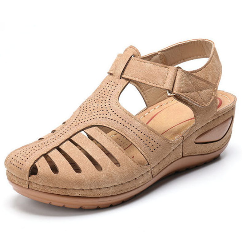 Beige suede retro wedge sandal for women featuring a perforated and slotted design with a plus size T-strap style.