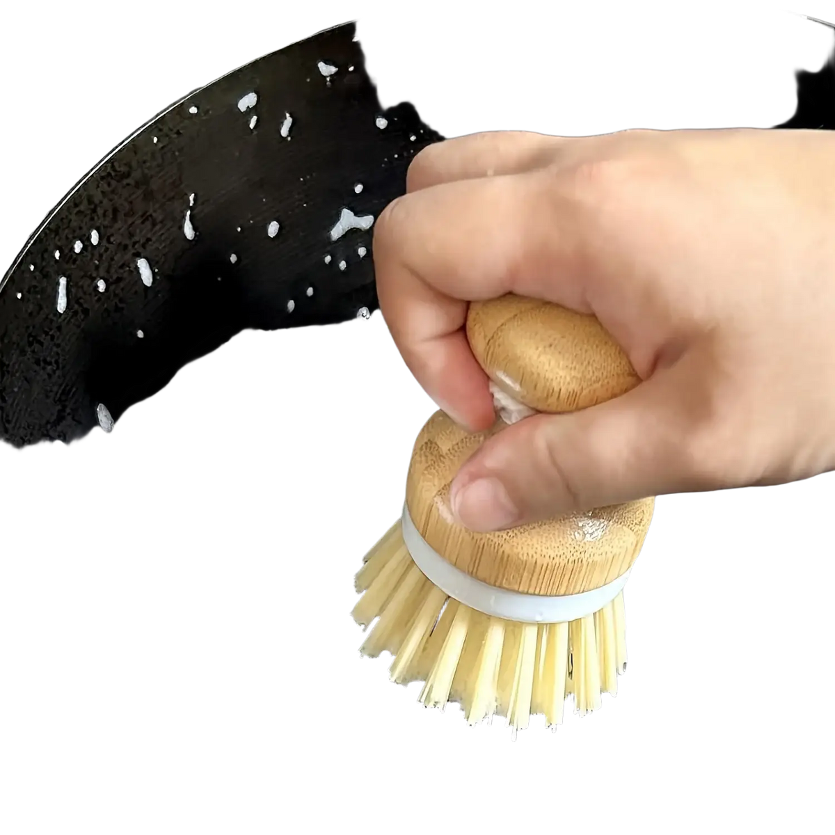 Eco friendly kitchen brush set with natural wood handle, light yellow bristles, and white band cleaning a soapy pan