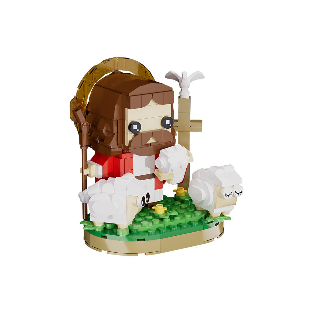 Un modèle de blocs de construction Jésus berger en Lego présentant une figure anguleuse aux cheveux bruns, vêtue de robes rouge et blanche, tenant un bâton, avec une colombe près de deux moutons blancs duveteux sur une base verte.