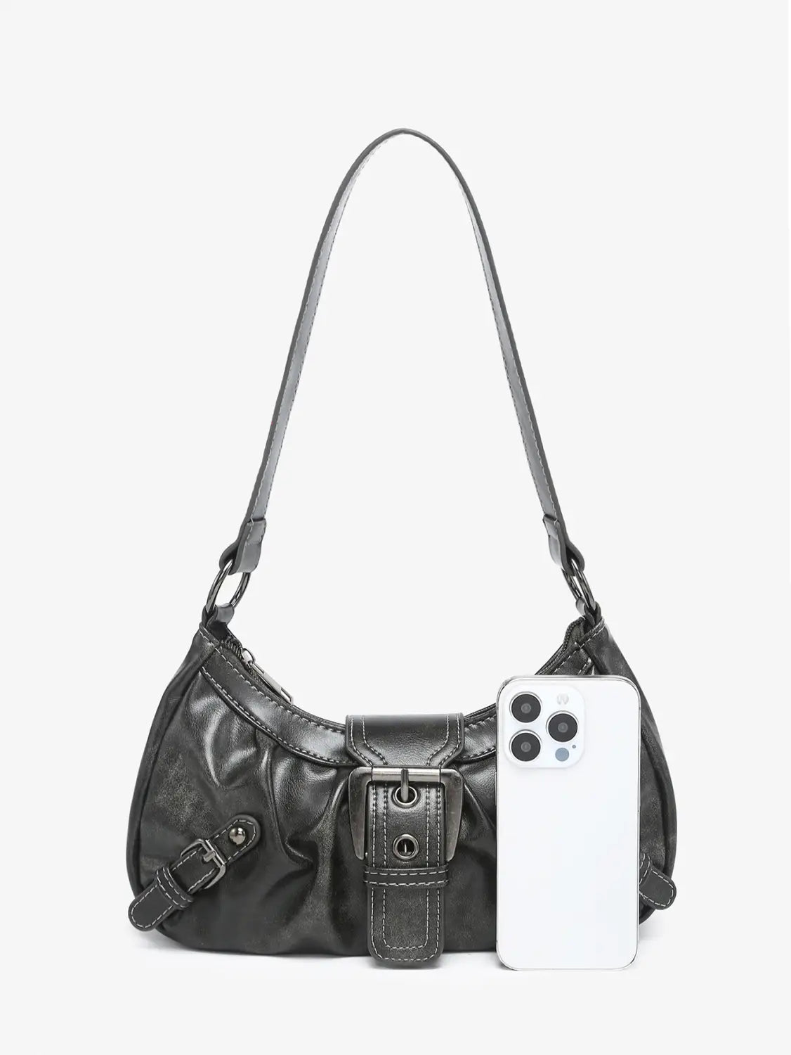 Black leather vintage shoulder bag with distinctive buckle design and adjustable strap.