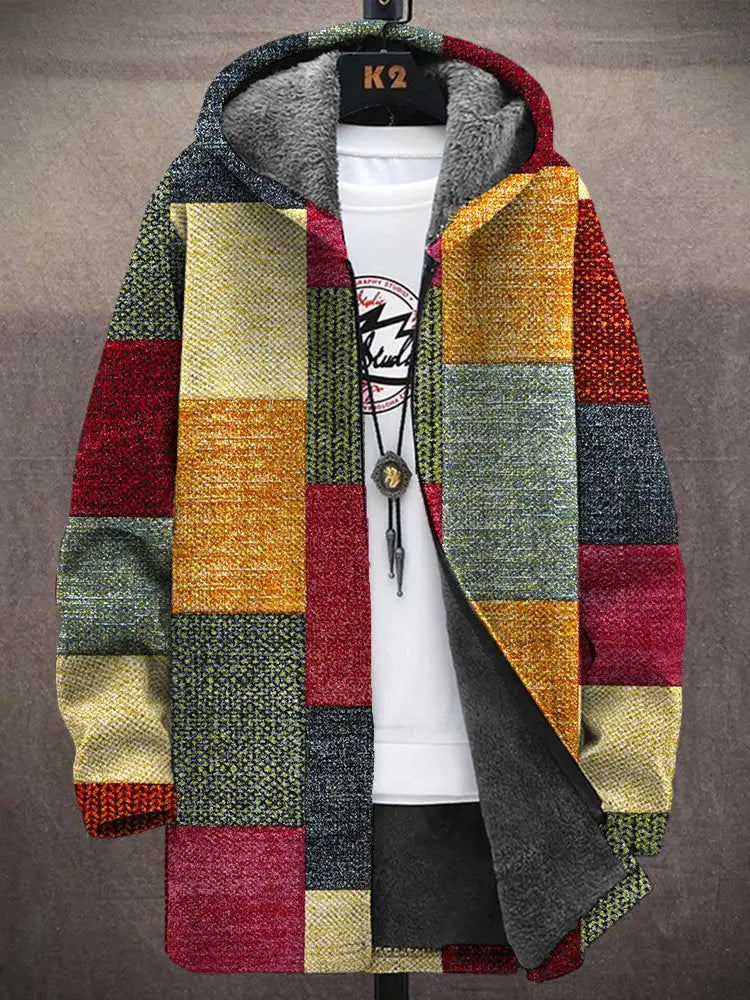 Geometric fleece men’s jacket featuring a colorful patchwork design with earthy tones, textured knit panels, and a plush gray-lined interior.