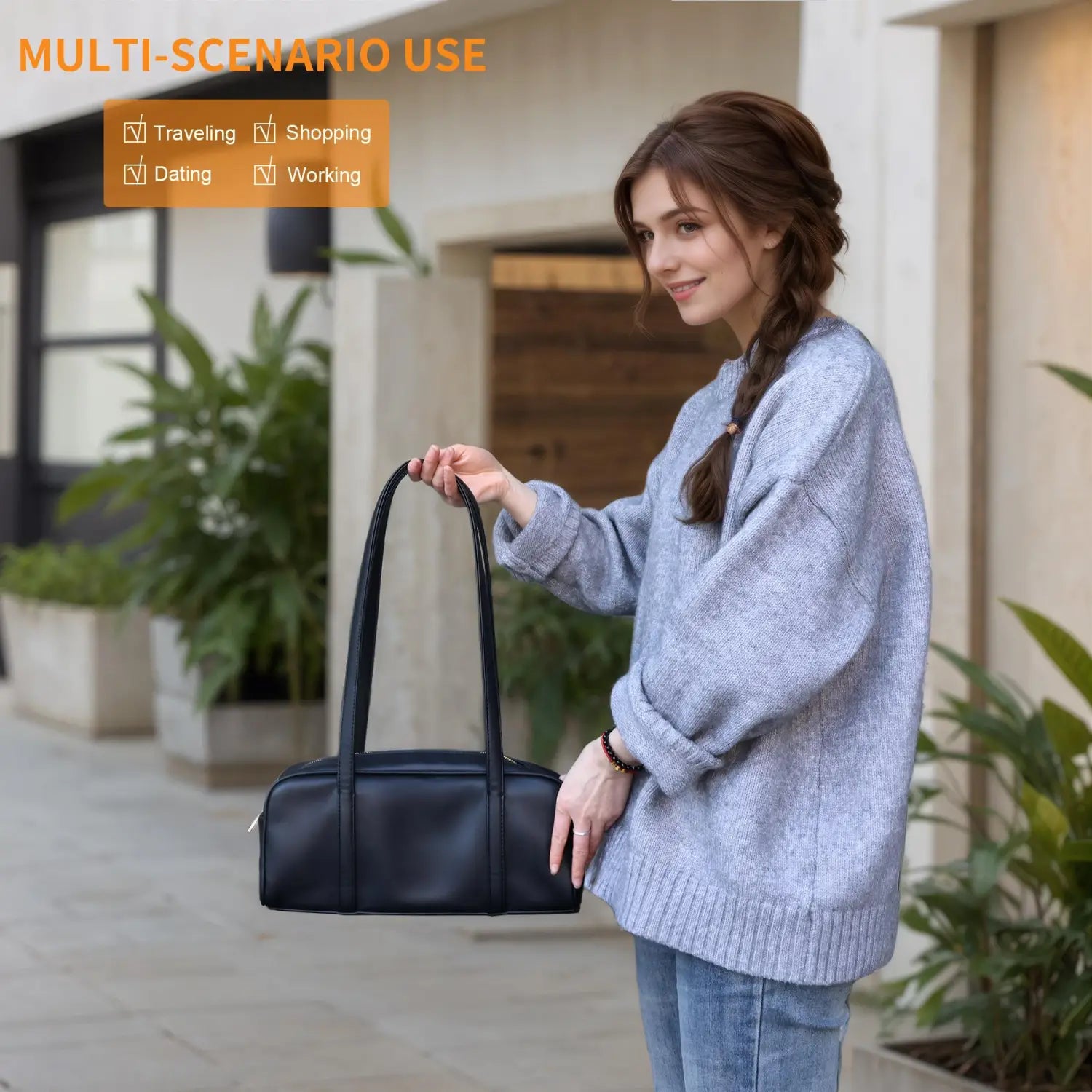 Black leather shoulder bag lxq026 chic leather single shoulder bag for women featuring a sleek minimalist design and two sturdy handles.