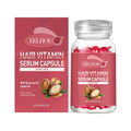 Shiny pink eelhoe moroccan oil hair repair capsules in a clear glass bottle with jojoba oil for frizz control