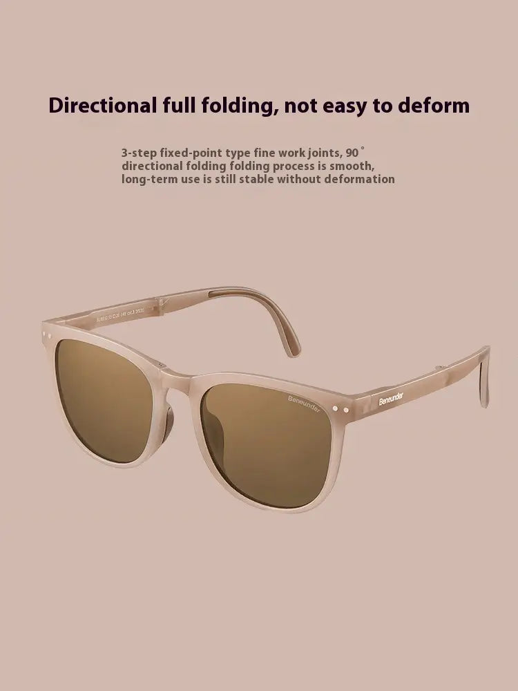 A pair of premium polarized folding sunglasses for women with translucent beige frames and brown gradient lenses featuring a sleek modern design.