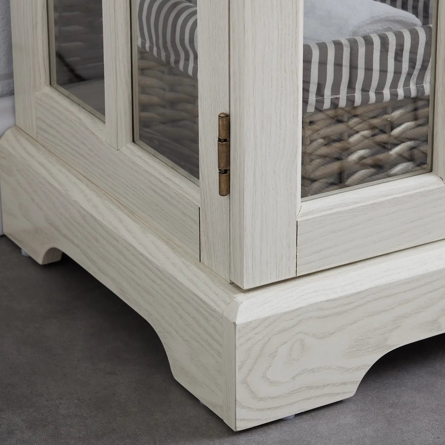 led curio display cabinet with lattice doors white featuring a white wood-finish cabinet with glass doors and brass hinge.