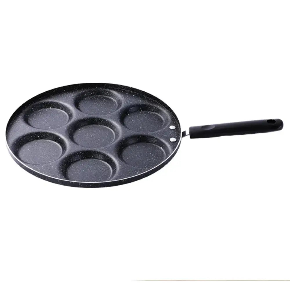 Black speckled nonstick 4-cup egg and pancake breakfast pan with seven circular indentations and black handle