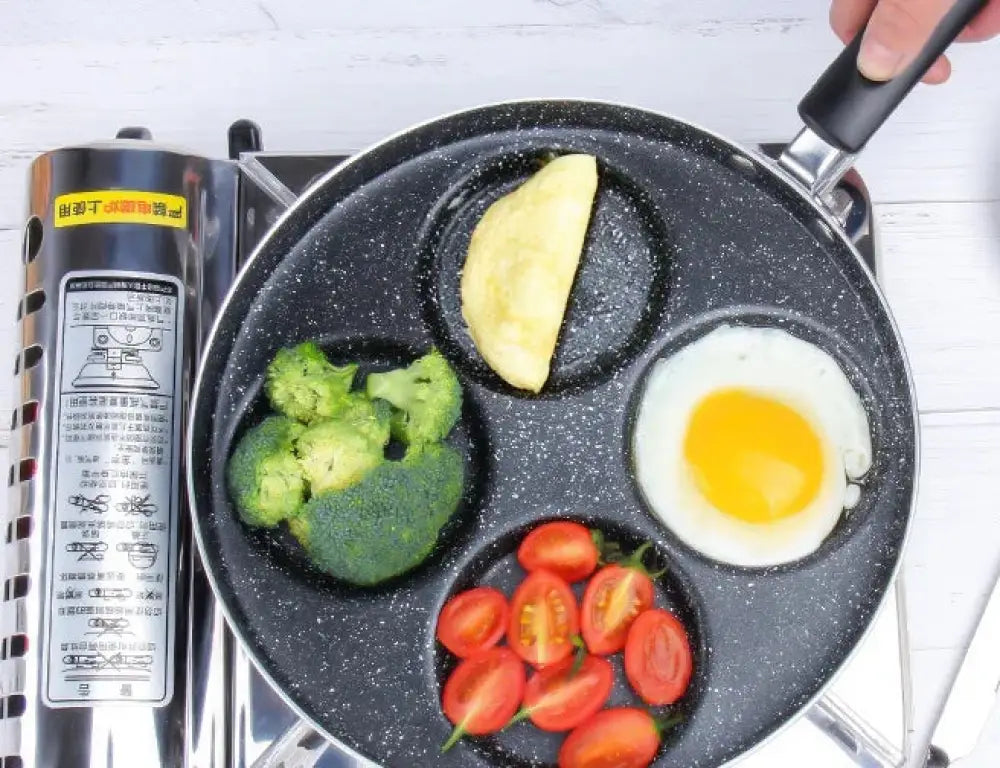 Black speckled nonstick three-compartment frying pan with black handle for eggs and pancakes 4-cup capacity
