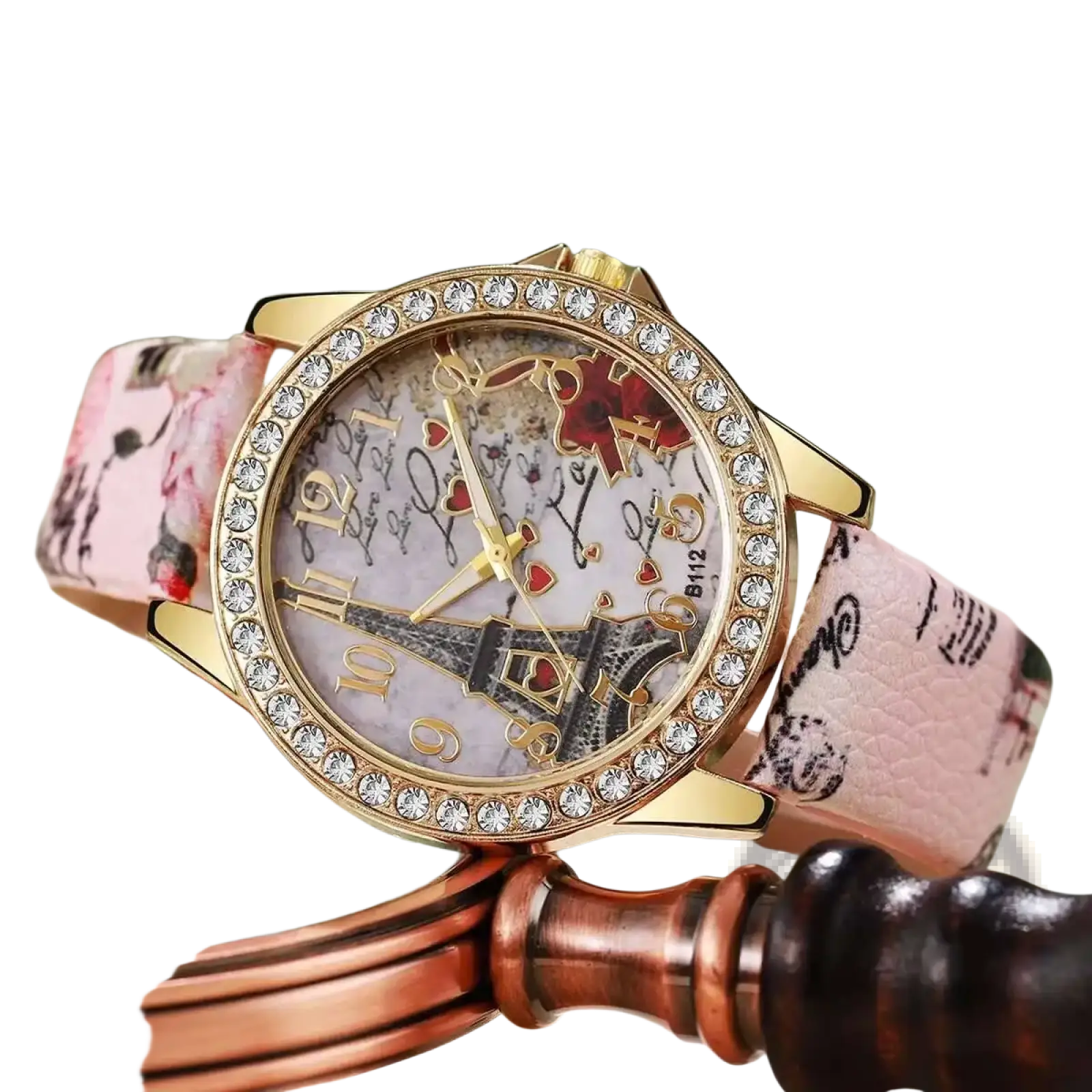 Eiffel Tower floral quartz women watch with pink floral strap, gold-tone crystal bezel, and illustrated dial design
