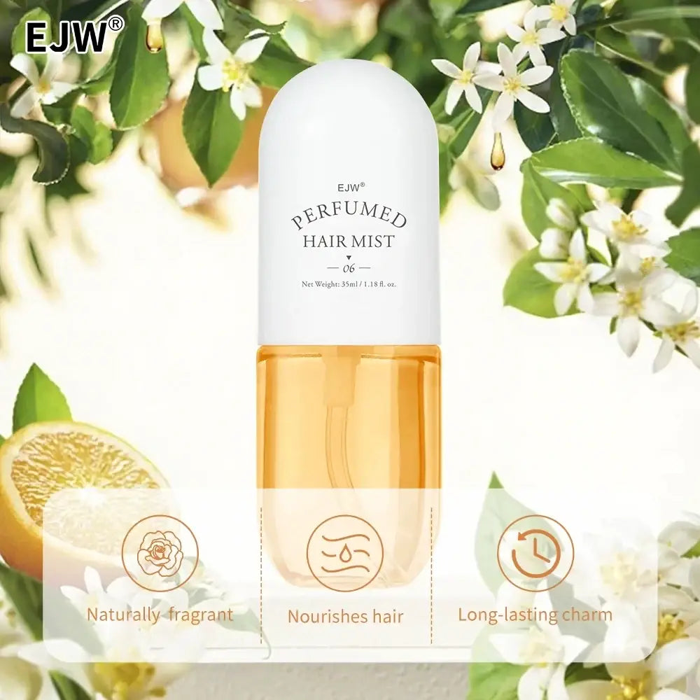 Ejw perfumed hair mist and essential oil spray in a sleek white and amber glass bottle with black lettering