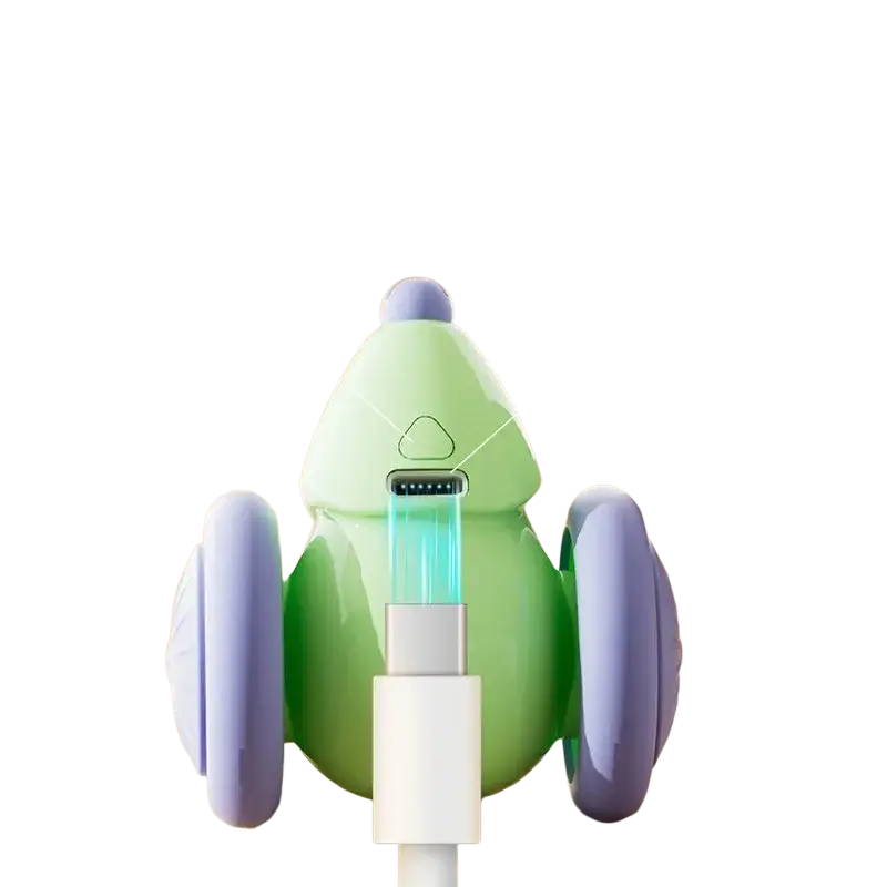 Electric cat toy mouse with wheels featuring a green and purple frog-shaped usb charging station and illuminated port