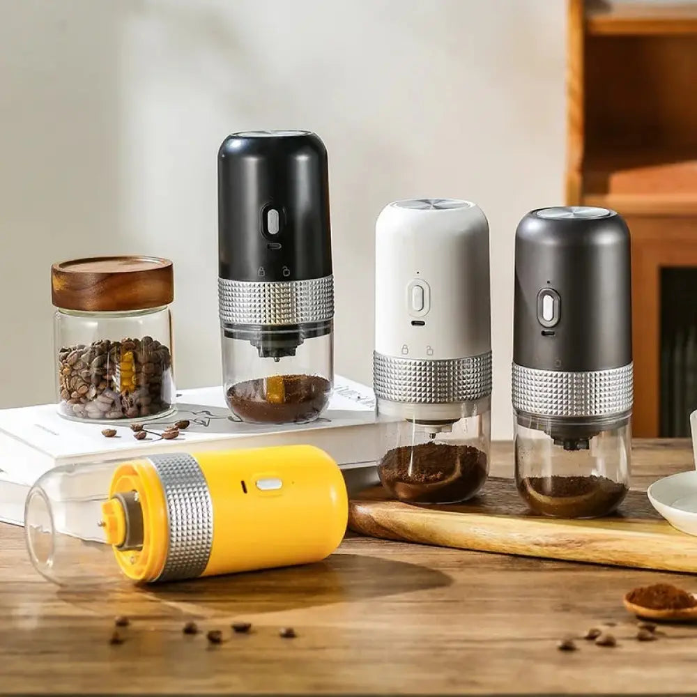 Compact automatic electric coffee grinder with metallic band in black white gray and yellow for portable use