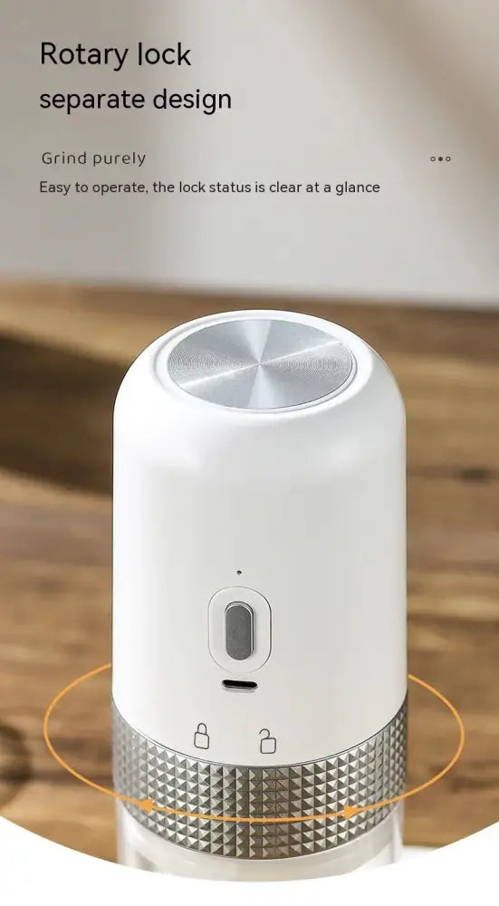 Compact automatic electric coffee grinder in white with a silver rotary lock top and textured metallic base