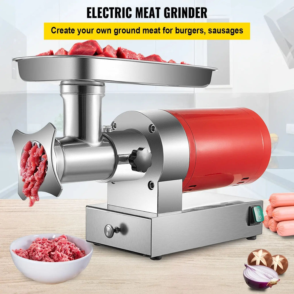 Red and stainless steel electric meat grinder 1100w with silver feed tray grinding raw beef into ground meat