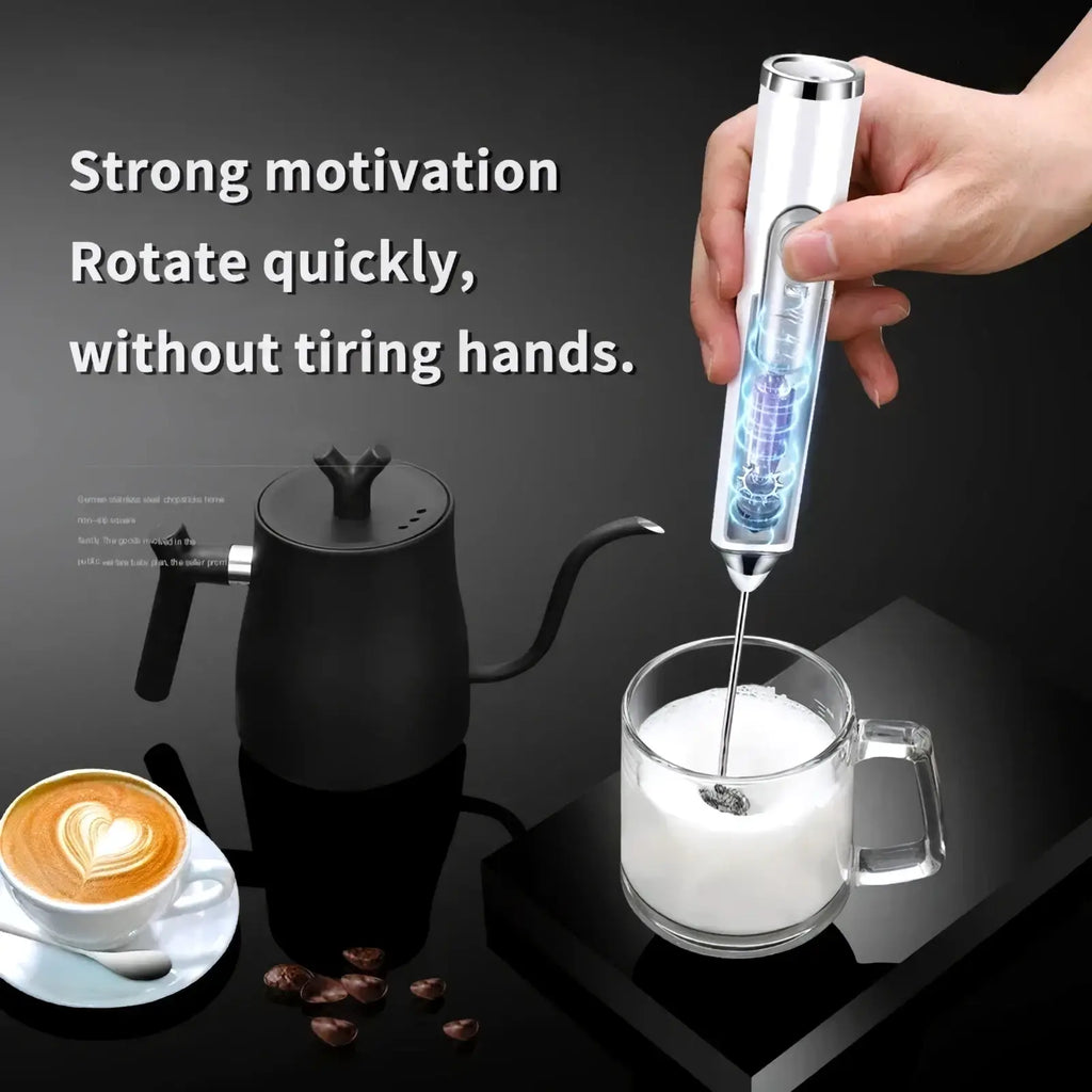 A sleek white and silver electric milk frother with transparent body whipping cream in a glass mug