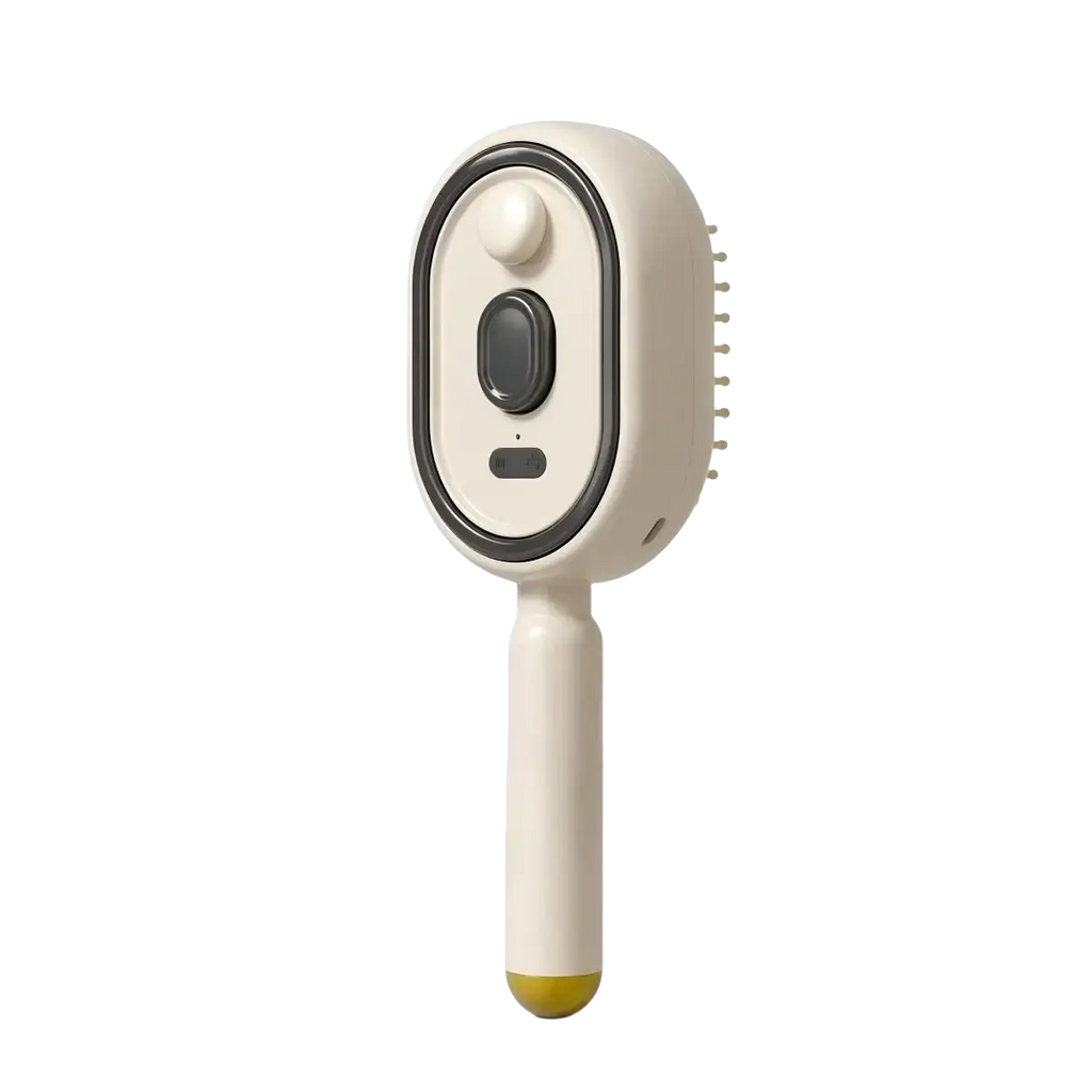Cream-colored electric spray air cushion massage comb with black accents and yellow-tipped handle for pets