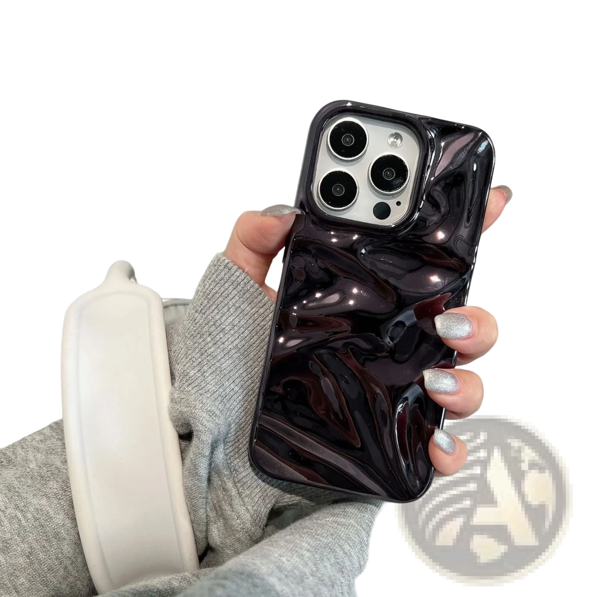 A glossy black electroplated 3d pleated phone case showing the back with a fluid marbled design
