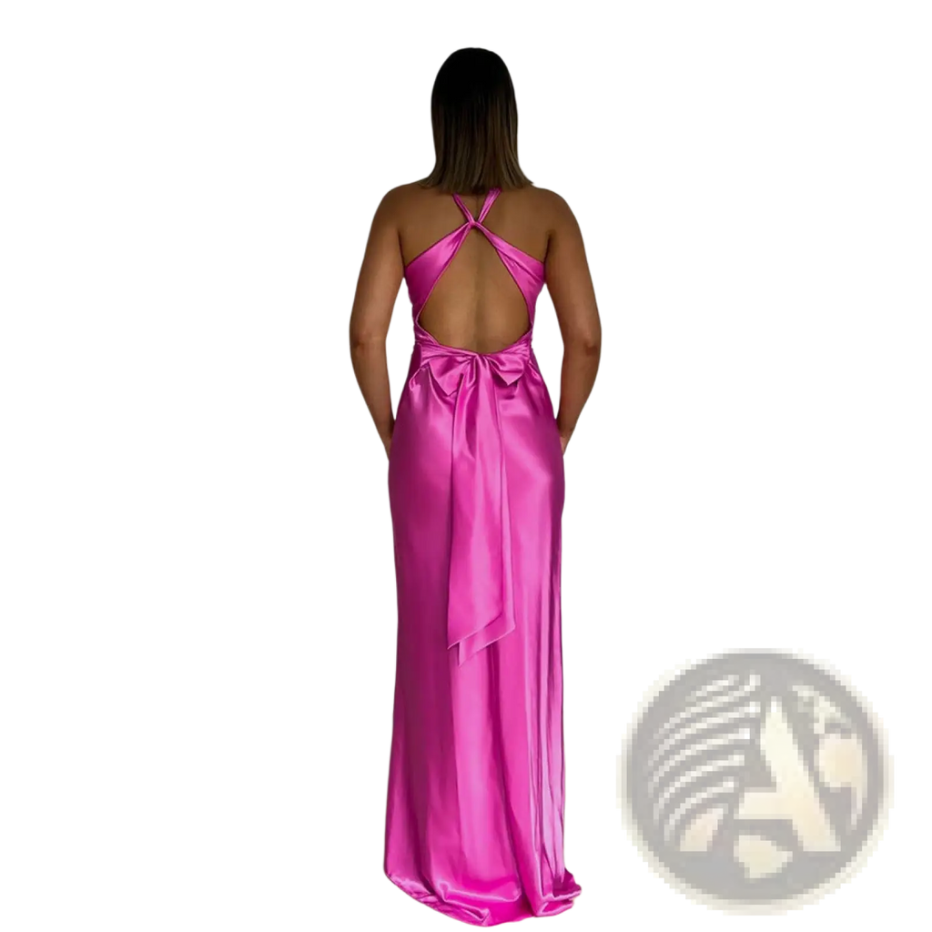 Back view of an elegant backless fuchsia satin a-line maxi dress with cross strap and bow detail