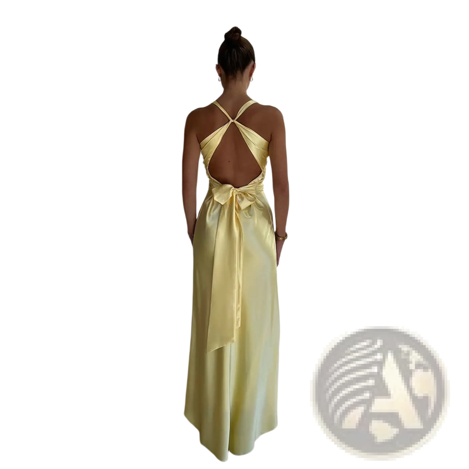 Elegant backless satin a-line maxi dress in pale yellow with halter neckline and open back tied with matching ribbon bow shown from back