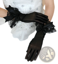 Elegant black satin evening gloves with lace cuffs and bow details, shown from the back side