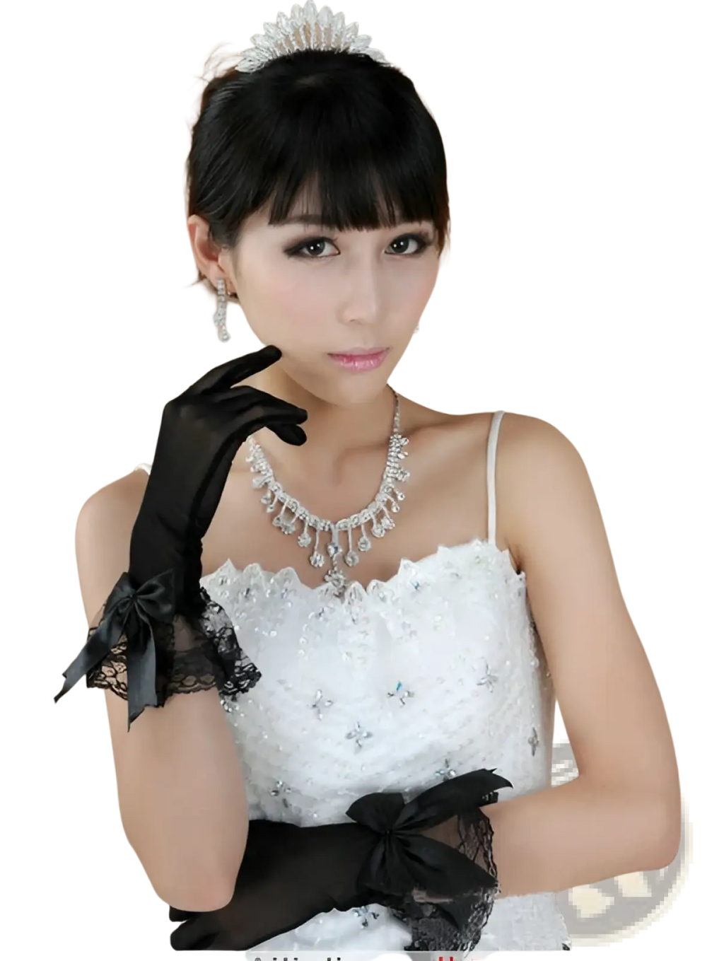 A woman wears elegant black lace and satin bow evening gloves with delicate lace cuffs and a white beaded wedding dress