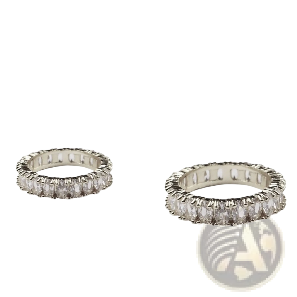 Silver eternity band rings from elegant eternity gemstone and pearl jewelry collection with oval-cut clear stones in polished metal frame