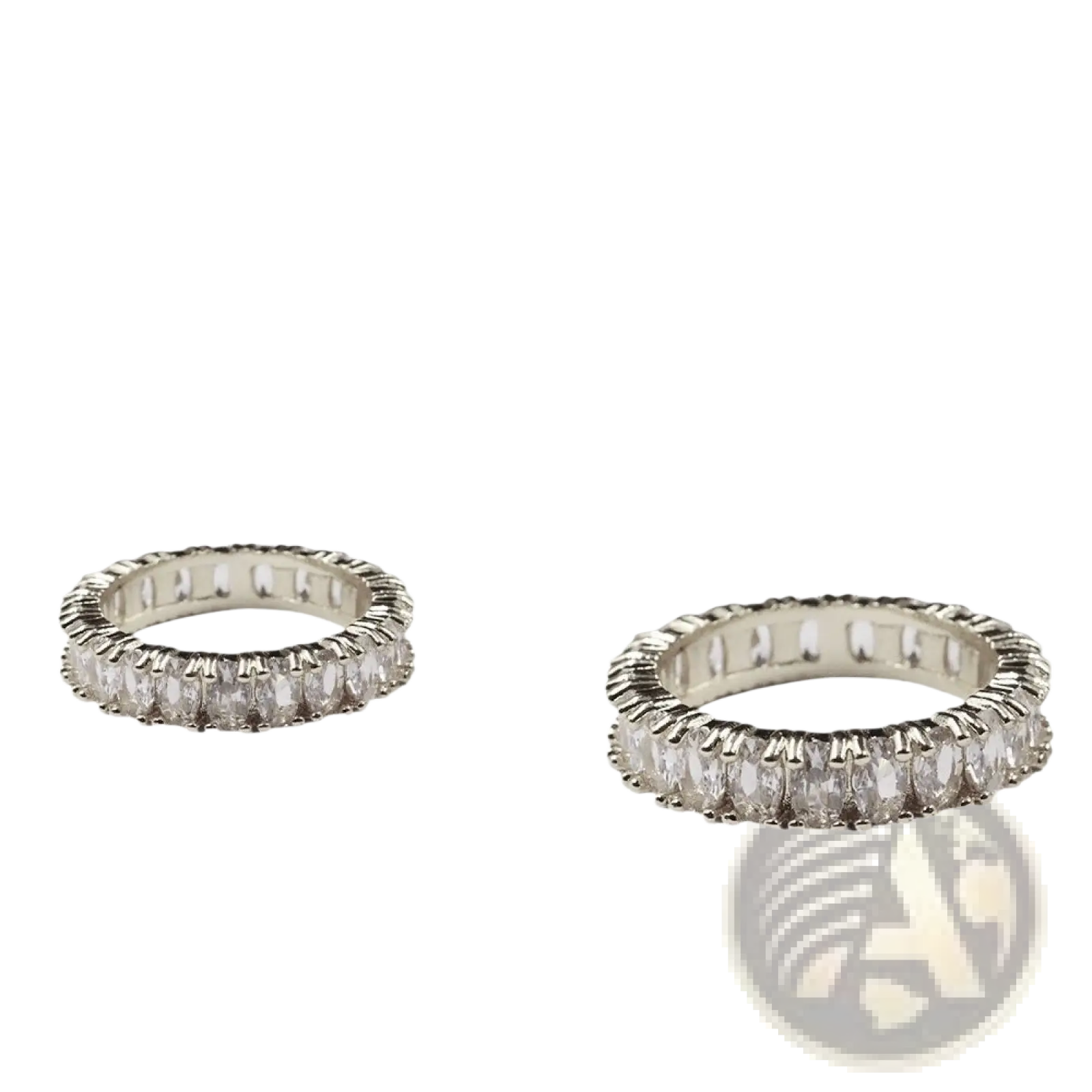 Silver eternity band rings from elegant eternity gemstone and pearl jewelry collection with oval-cut clear stones in polished metal frame