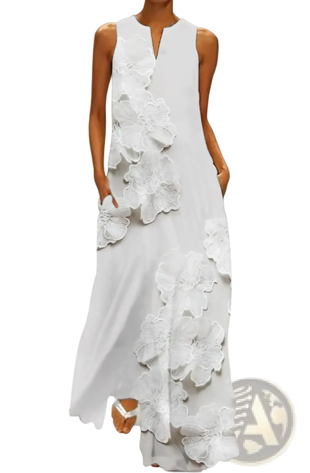 A flowing white sleeveless maxi dress with intricate three-dimensional white lace floral appliqué adorning both sides