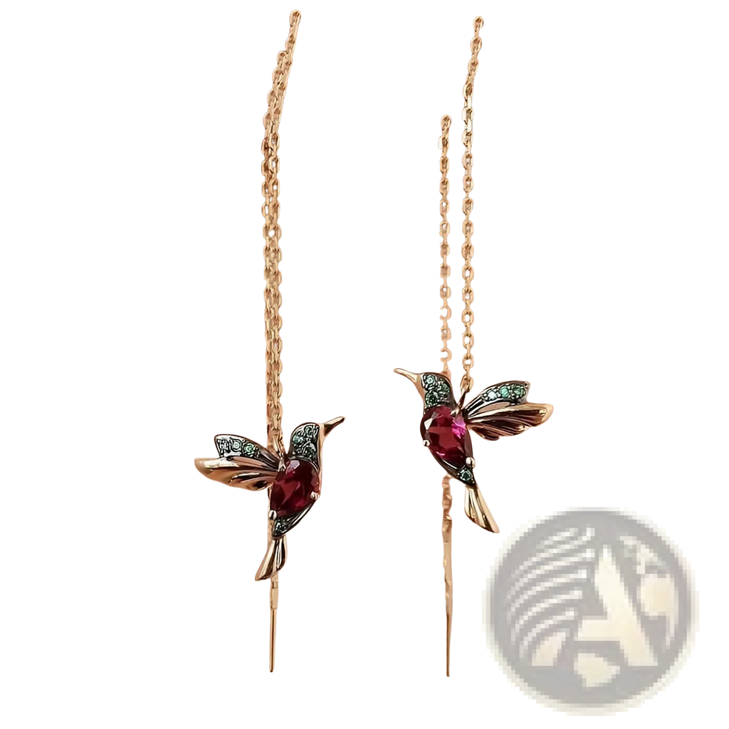 Delicate gold-toned hummingbird ear cuffs with central ruby-red gemstone and green accents for elegant wear